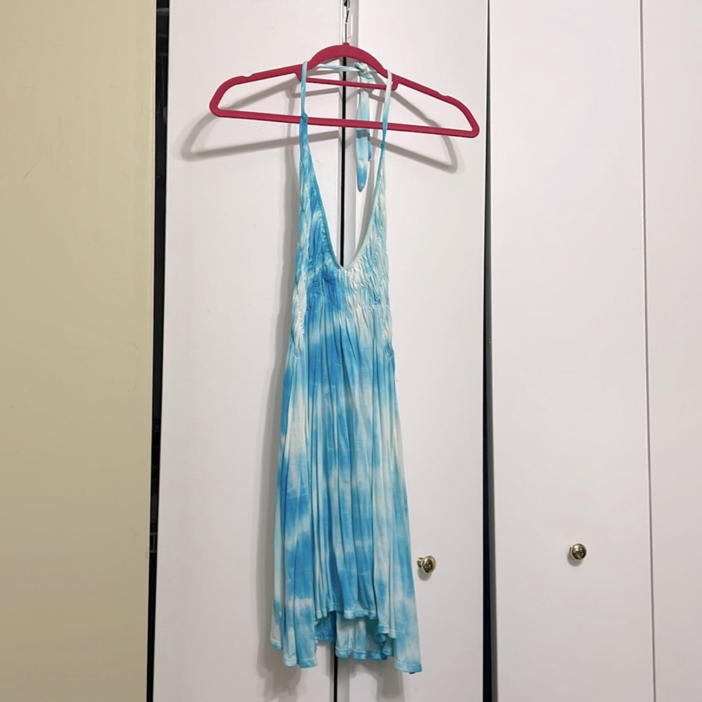 Boy and white flowy summer top with tie straps